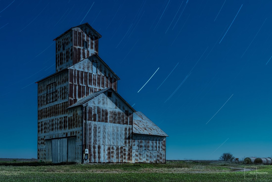 Night photography, abandoned grain elevator, rural Kansas.